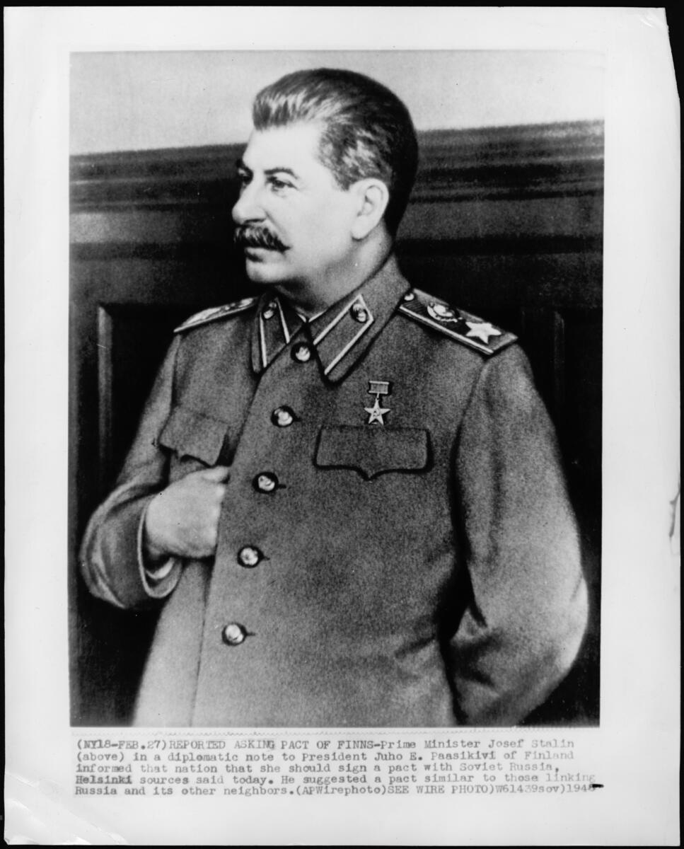 Joseph Stalin — hidden hand in uniform jacket — 1948